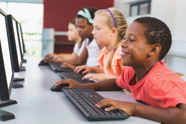 Students learning on computer